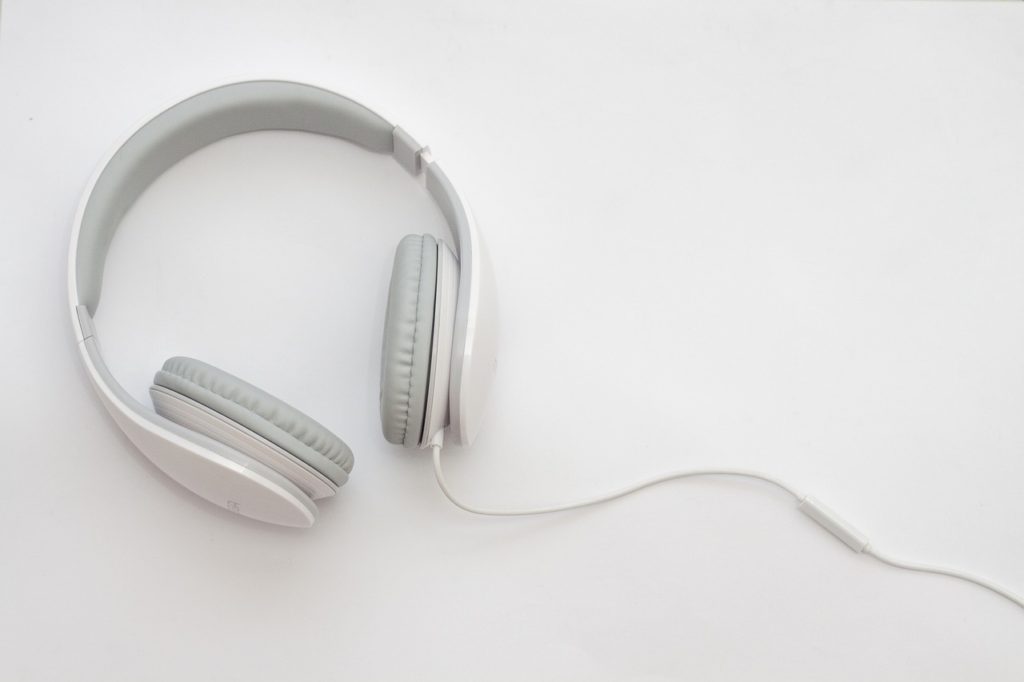 headphones,  how to survive a 17-hour flight in economy